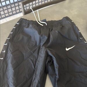 Nike Black Joggers with White Accents